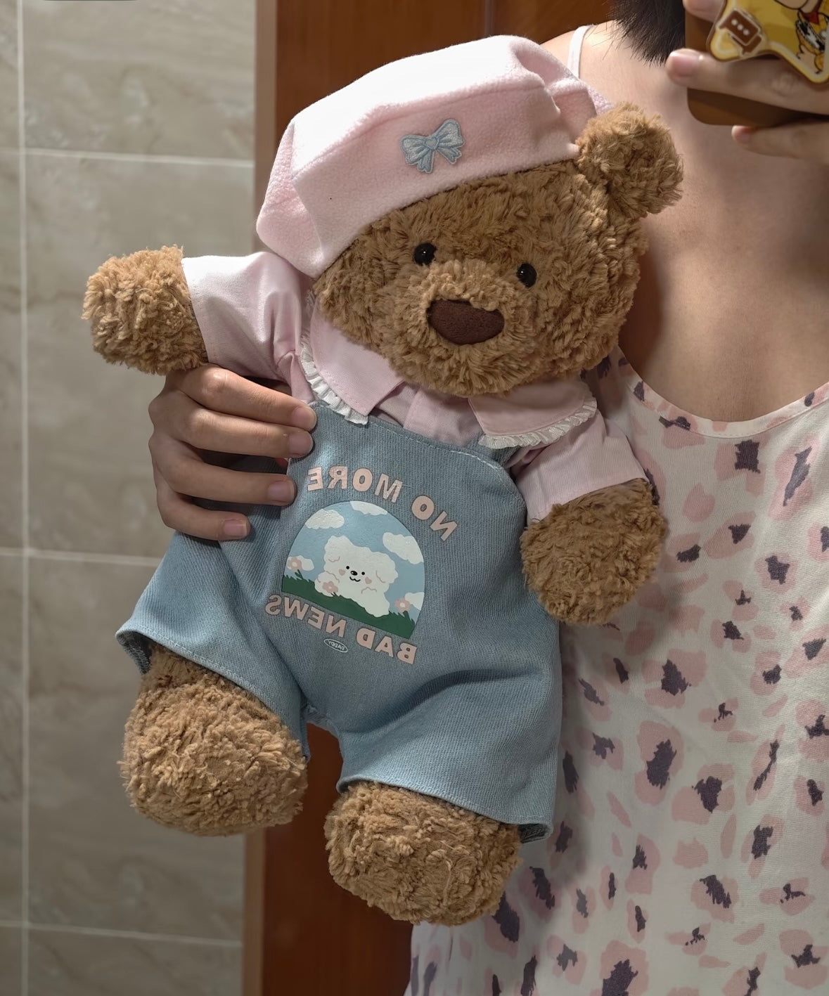 Bartholomew Bear wearing No More Bad News dungaree set - close up