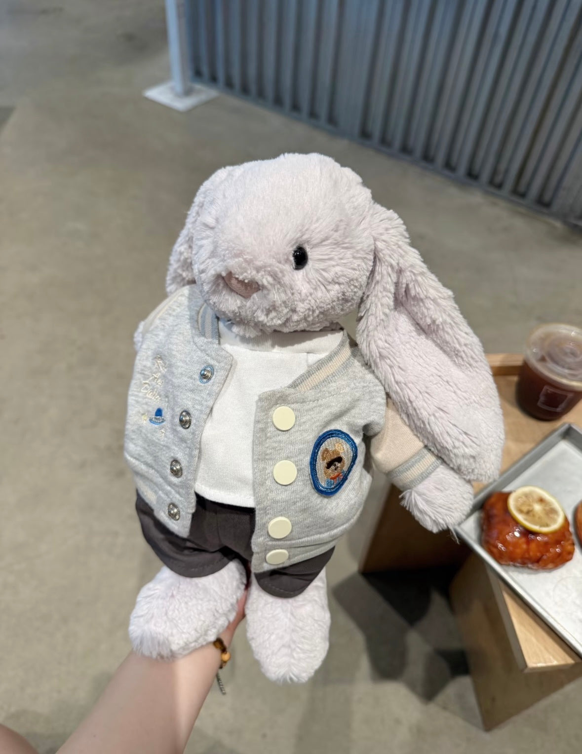Bashful Bunny wearing varsity set - held up view