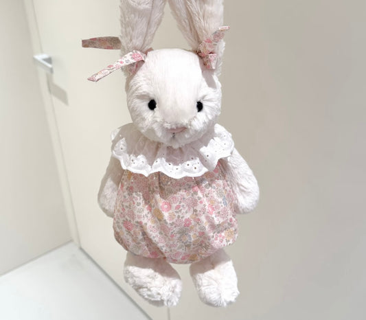 Bashful Bunny floral romper set - close up front view hanging