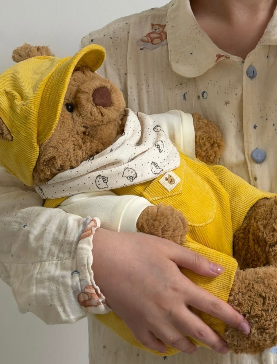 Bartholomew Bear showing the green corduroy outfit and matching cap