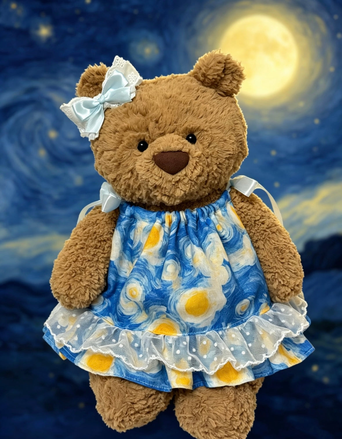 Bartholomew Bear wearing a blue starry-night-print dress with lace ruffle and pale bow against a night-sky backdrop