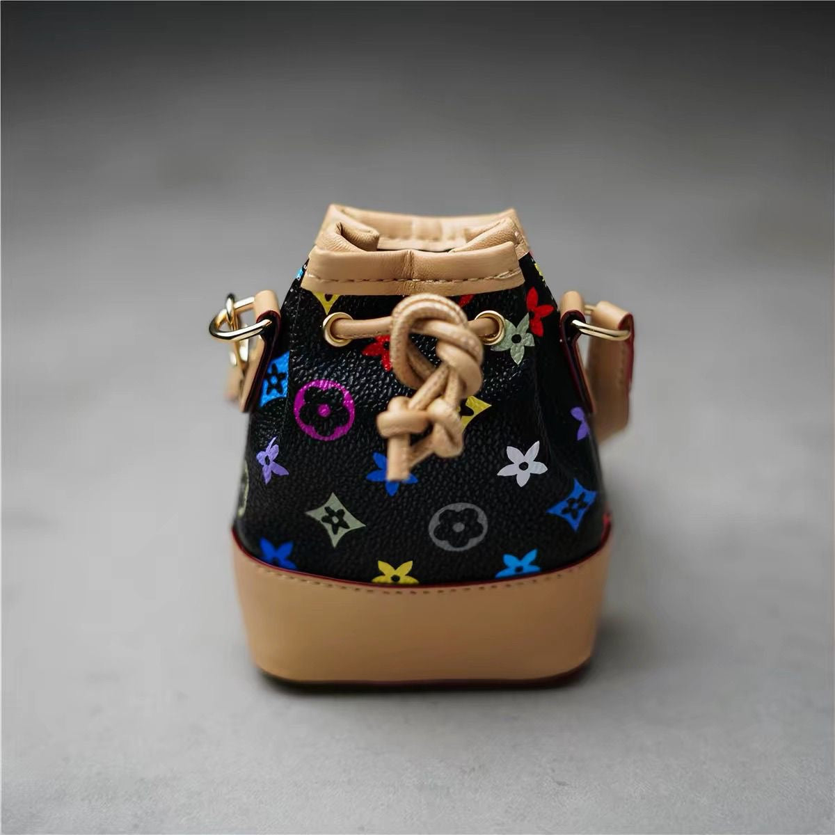 Mini white handbag with multicoloured motifs and tan handles