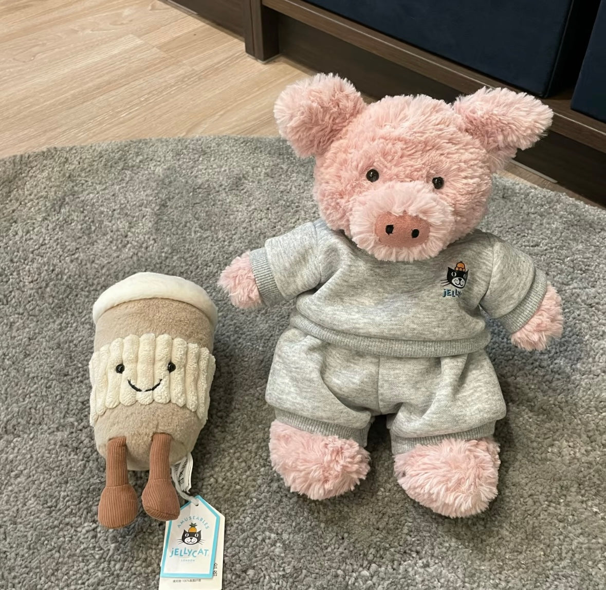 Pink pig in grey Jellycat sweatsuit set with coffee cup plush