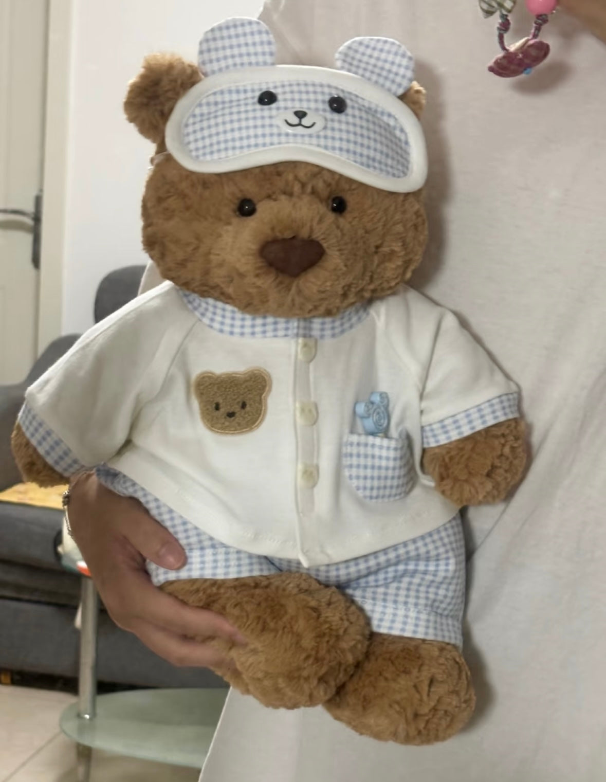 Bartholomew Bear wearing blue gingham pyjama set - front view