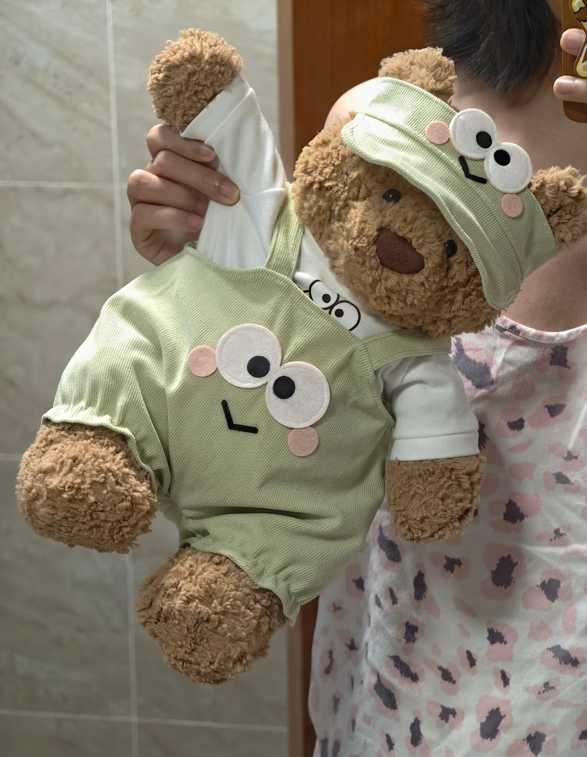 Brown bear plush wearing frog dungaree set - front view