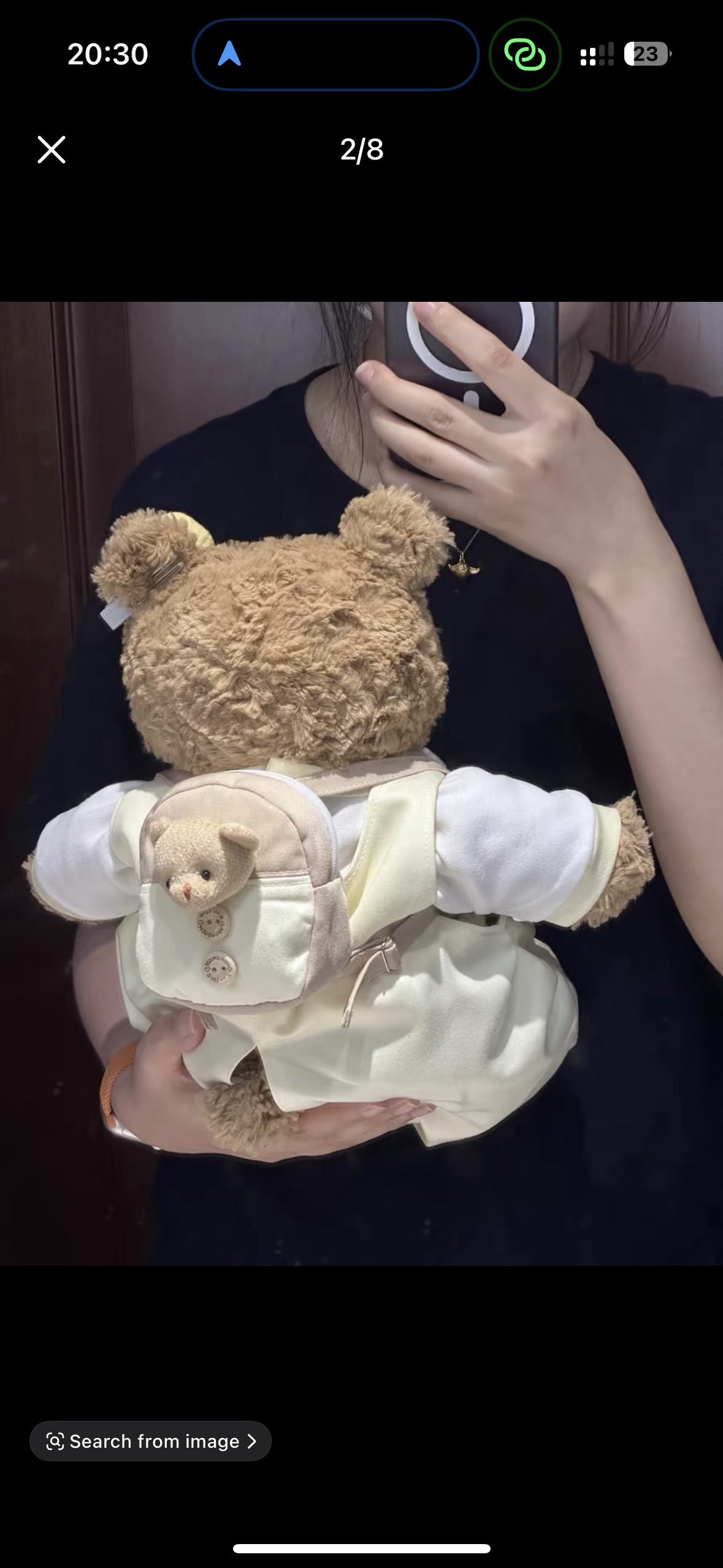Bartholomew Bear wearing butter yellow dungaree set, back view showing mini backpack