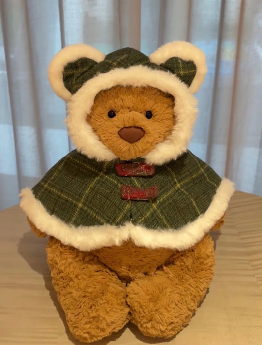 Bartholomew Bear wearing forest green tartan tweed cape with sherpa trim and bear ear hood