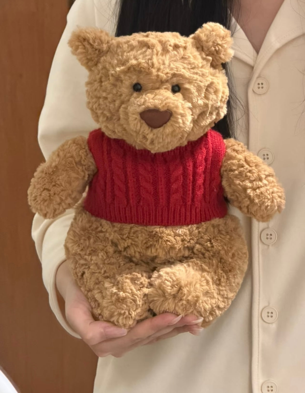 Bartholomew Bear wearing red cable knit sweater vest front view