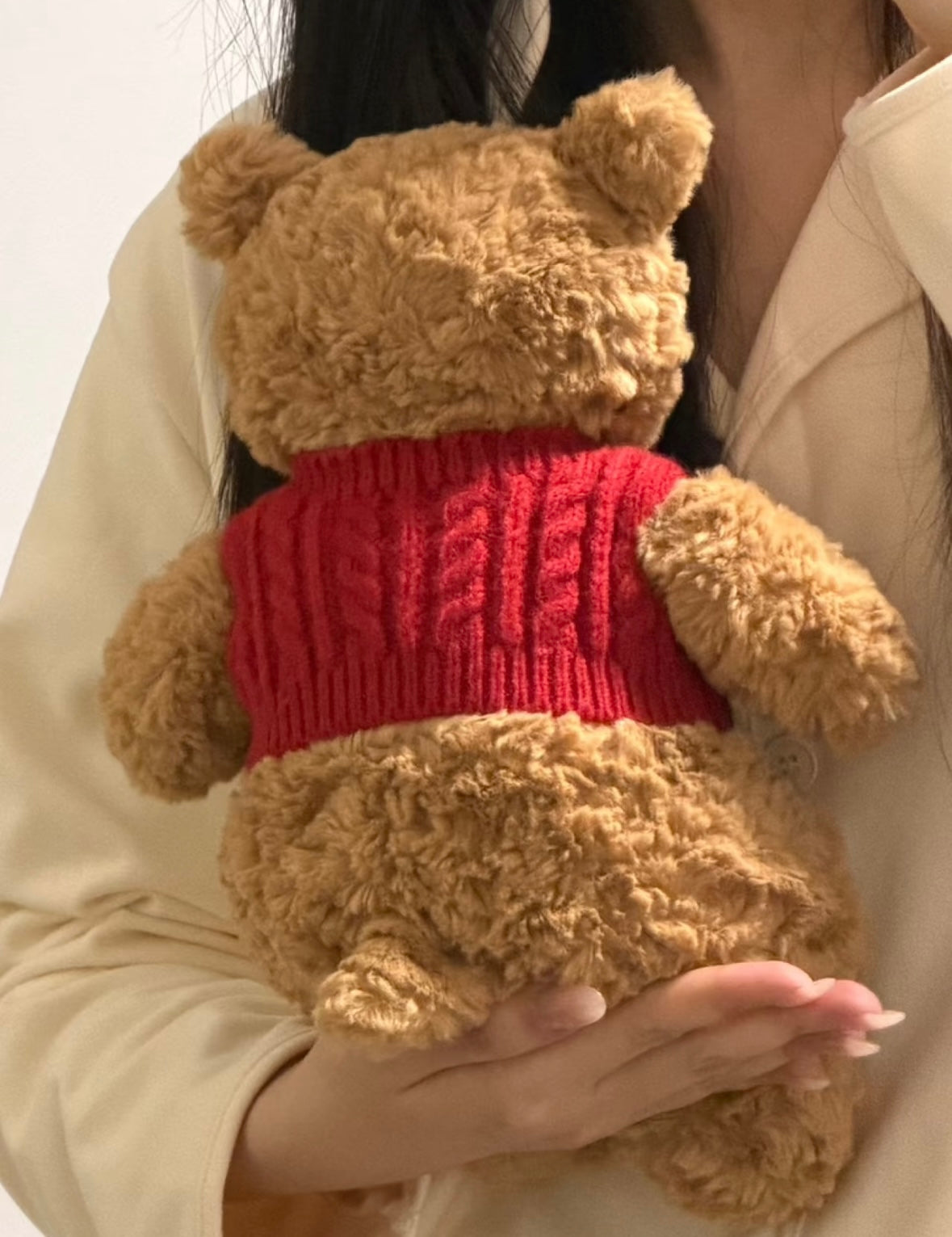 Bartholomew Bear wearing red cable knit sweater vest back view