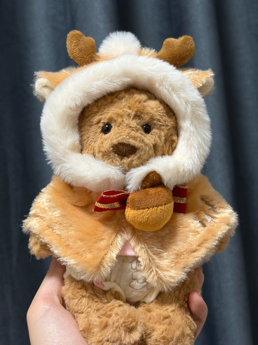 Bartholomew Bear wearing reindeer cape close up with jingle bell detail