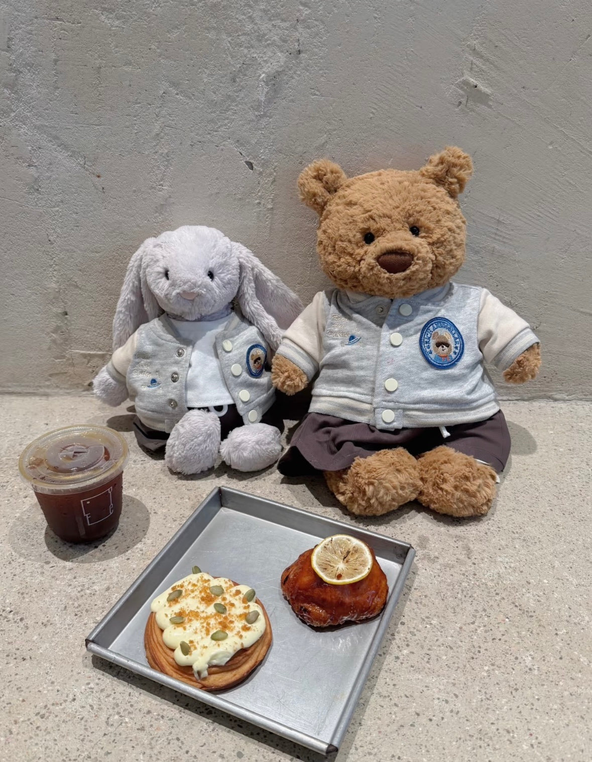 Bashful Bunny and Bartholomew Bear both wearing matching varsity sets