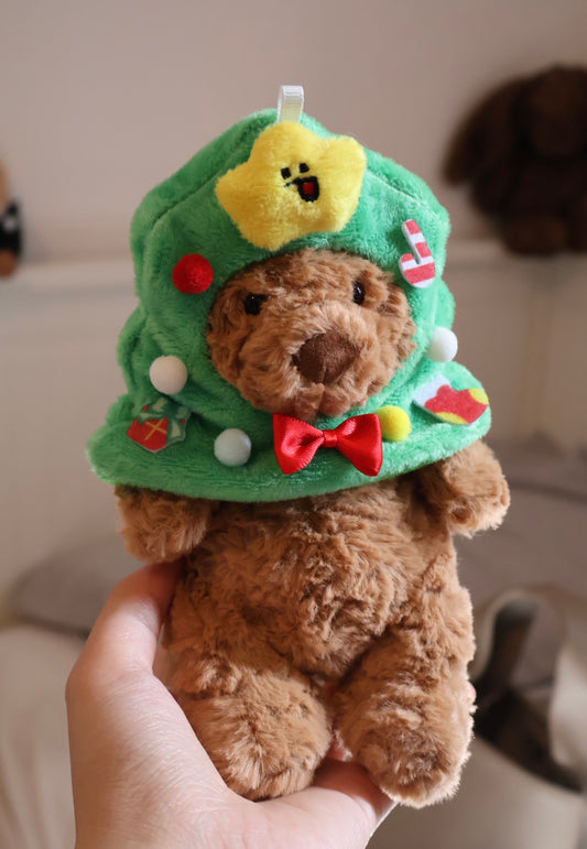 Bartholomew Bear wearing Christmas tree hat - front view with star, baubles and red bow