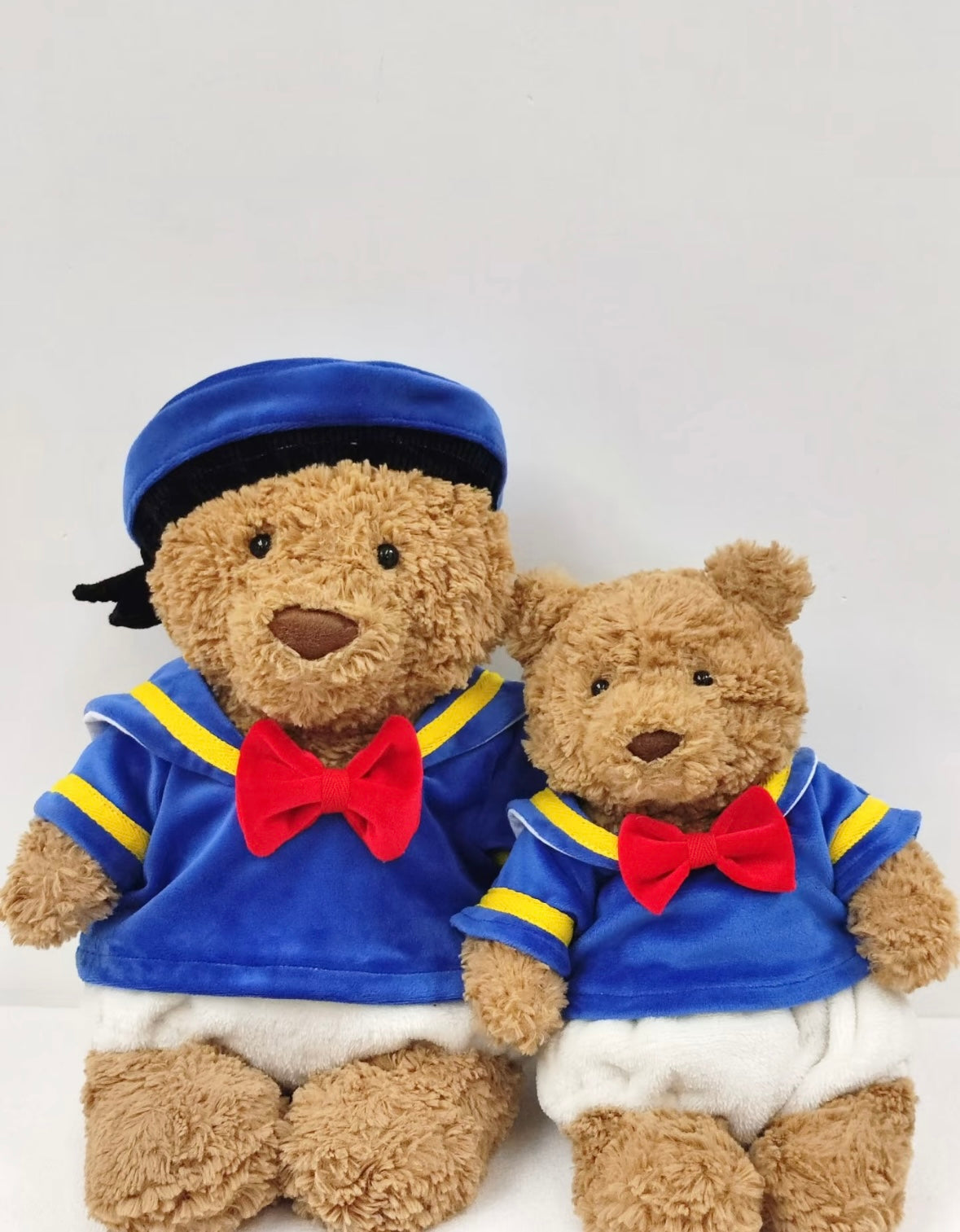 Bartholomew Bear and smaller bear both wearing sailor sets - size comparison