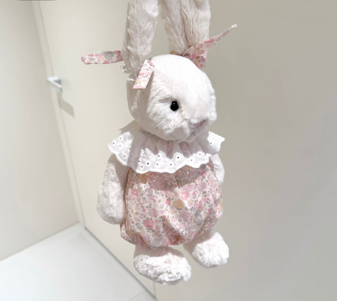 Bashful Bunny floral romper set - angled view showing puff sleeves and bloomers