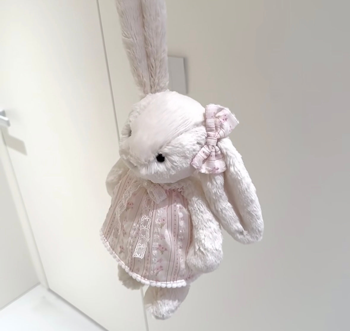 Bashful Bunny vintage lace dress - side profile hanging view showing bow detail