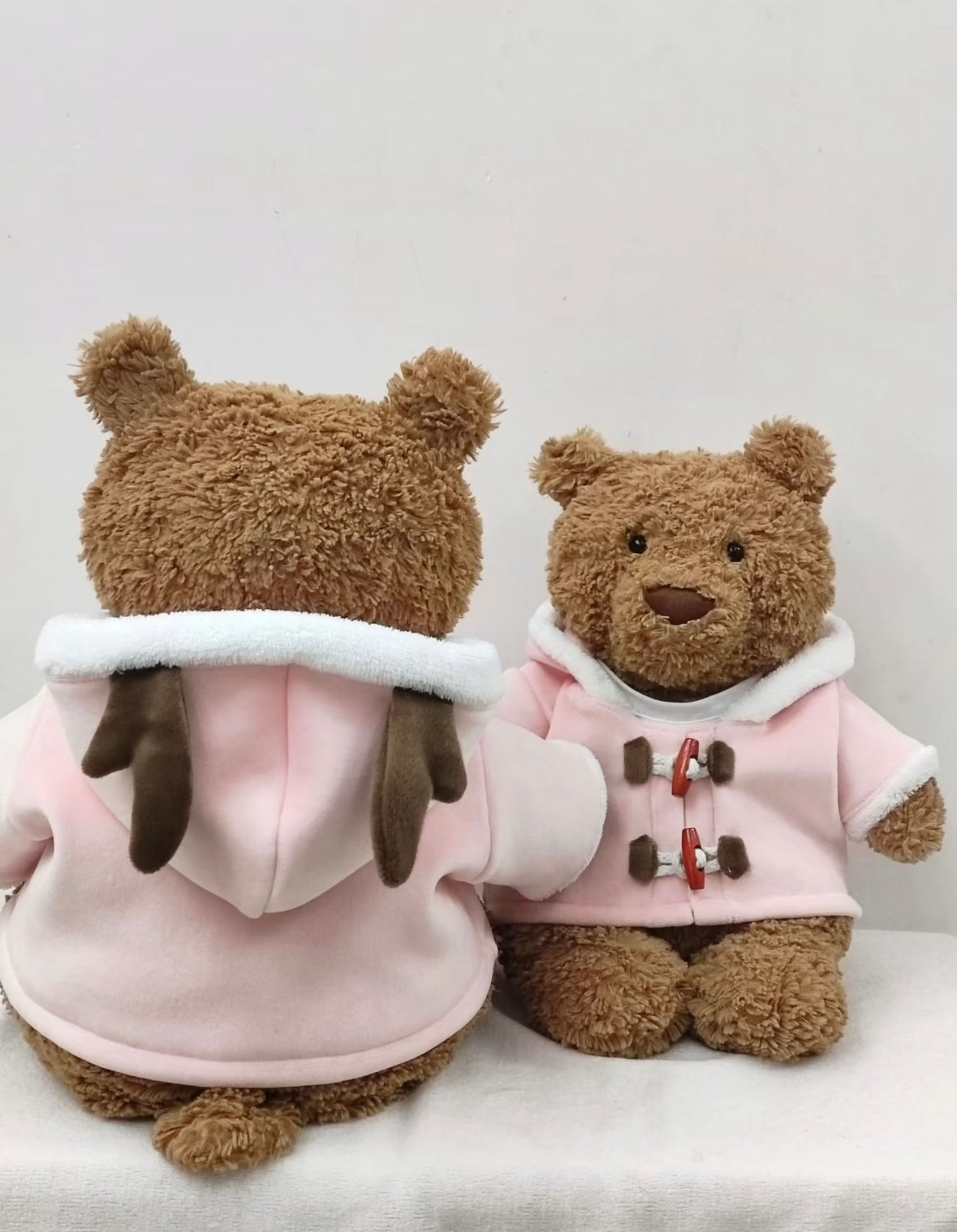 Bartholomew Bear pink duffle coat - back view and small bear front view showing sherpa hood lining