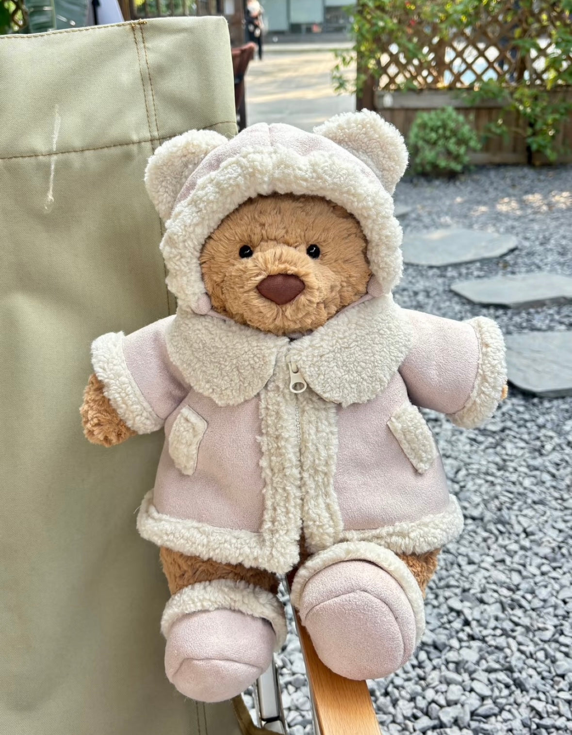 Bartholomew Bear in blush pink shearling snowsuit with hood