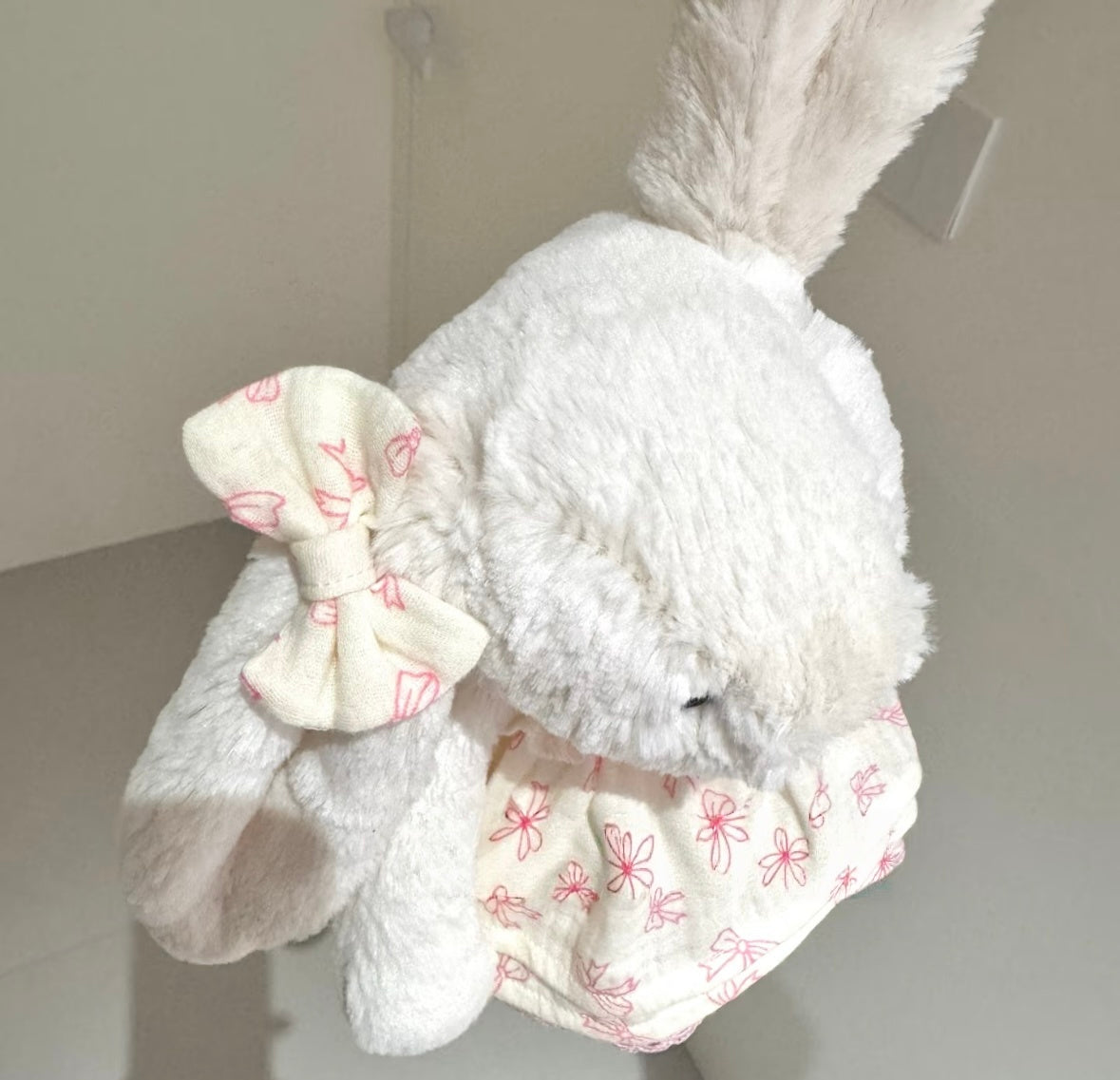 Back view of pink bow skirt set showing drawstring gather detail