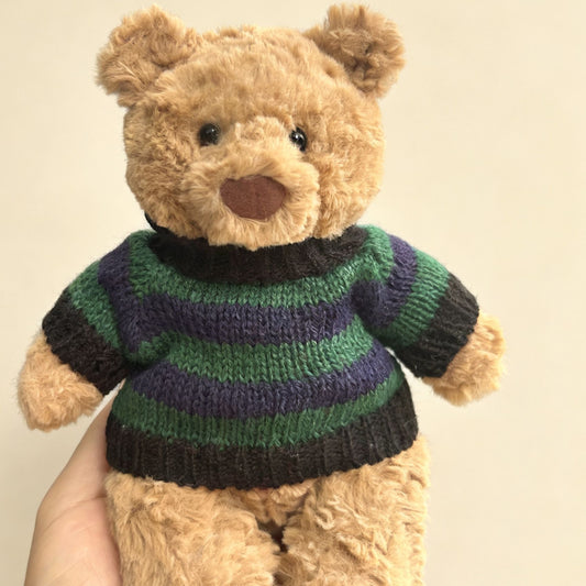 Brown plush bear wearing chunky navy, forest green and charcoal stripe knitted jumper